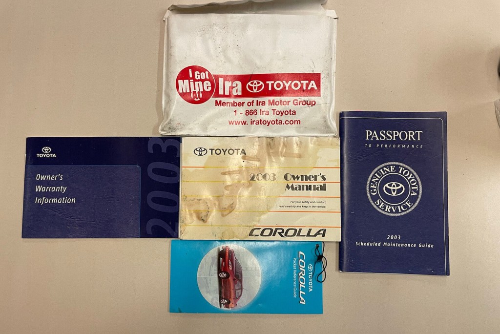 Picture of: TOYOTA COROLLA OWNERS MANUAL With Pocket Reference Guide W Supplements